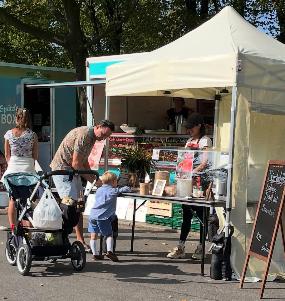 Valeria at the first market stand