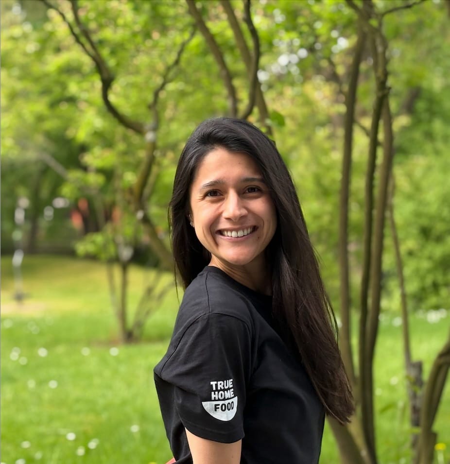The True Home Food team serving fresh food at an event